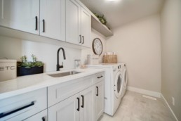 laundry room in the midland showhome by western living homes