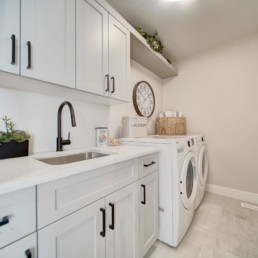 laundry room in the midland showhome by western living homes